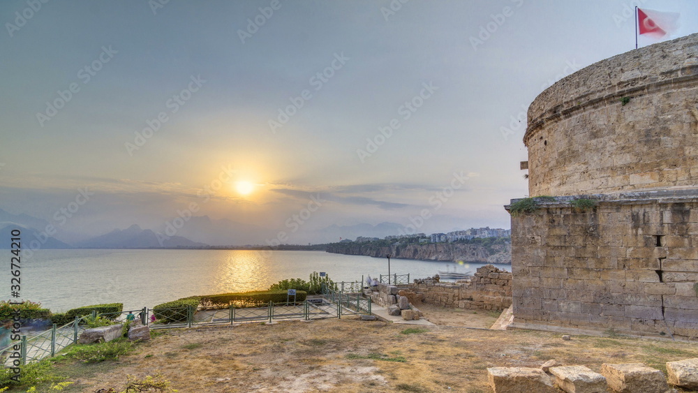 Hidirlik tower in Kas town in Antalya timelapse with view of harbor marine bay is a old city
