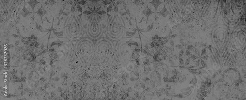 Old gray dark vintage shabby patchwork tiles stone concrete cement wall texture background banner