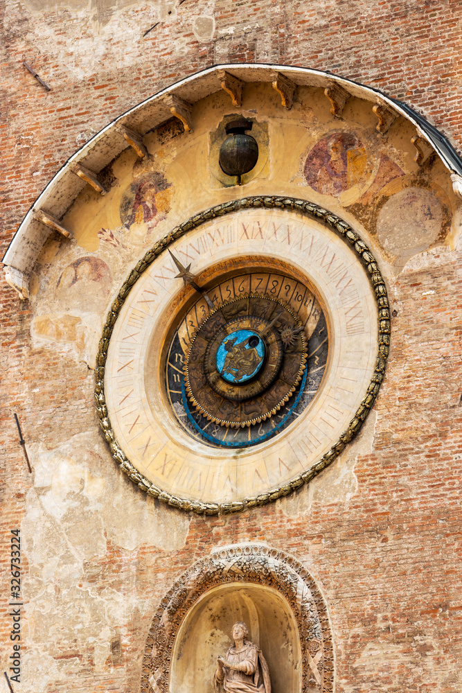 The 15th-century Torre del'Orologio or Clock Tower with astronomical clock in Mantova or Mantua, Lombardy, Italy, exterial partial view