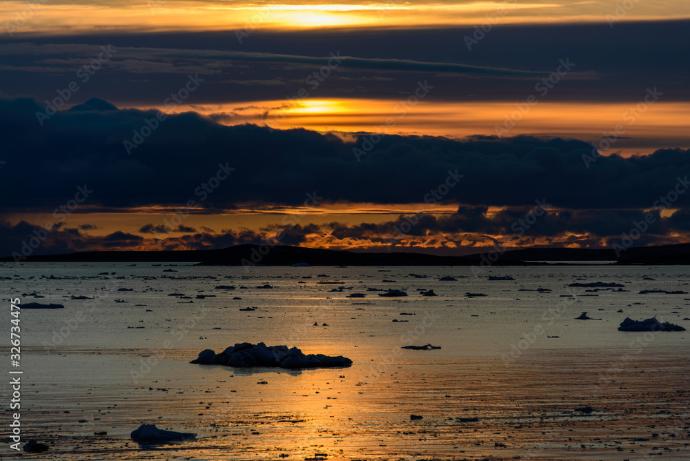 Beautiful Arctic landscape at sunset time.