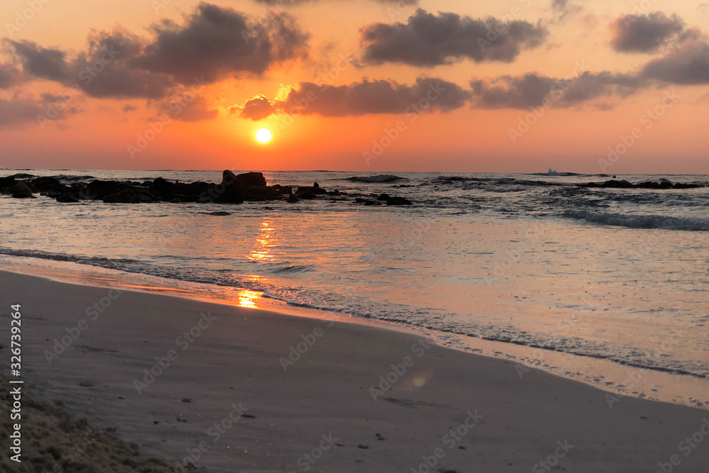 Sunset on the Caribbean sea of cuba beach