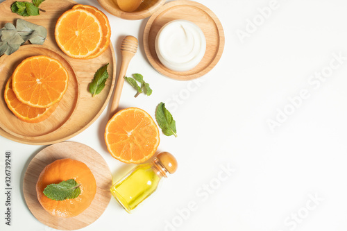 beauty treatment medical skincare and cosmetic lotion cream serum oil mockup bottle packaging product with nature fruit orange herbal on white decor background