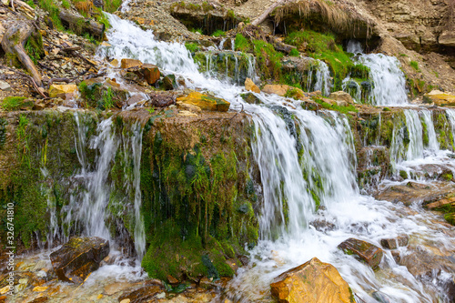 The waterfall is located on the hillside. Izborsk  Pskov region  Russia.