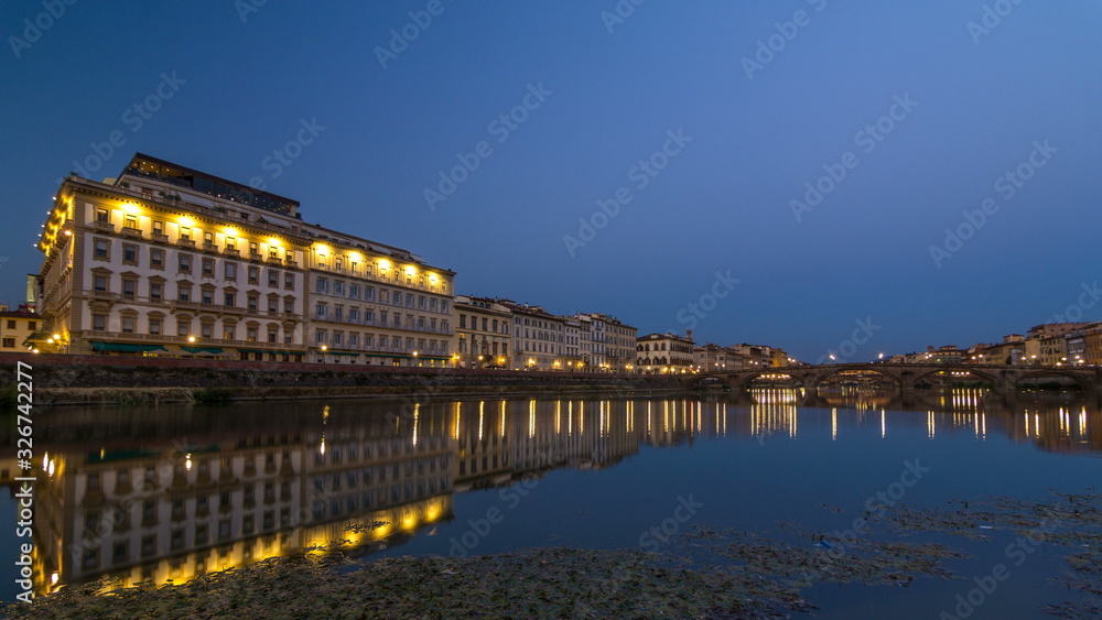 Twilight sky scene of Ponte Alla Carraia Bridge day to night timelapse over River Arno