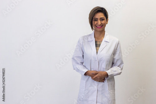 Portrait of happy pretty latin young woman model laughing. Pharmacist, beauty therapist, doctor, nurse, scientist, ophthalmologist, beautician, veterinarian, optometrist, isolated on white background