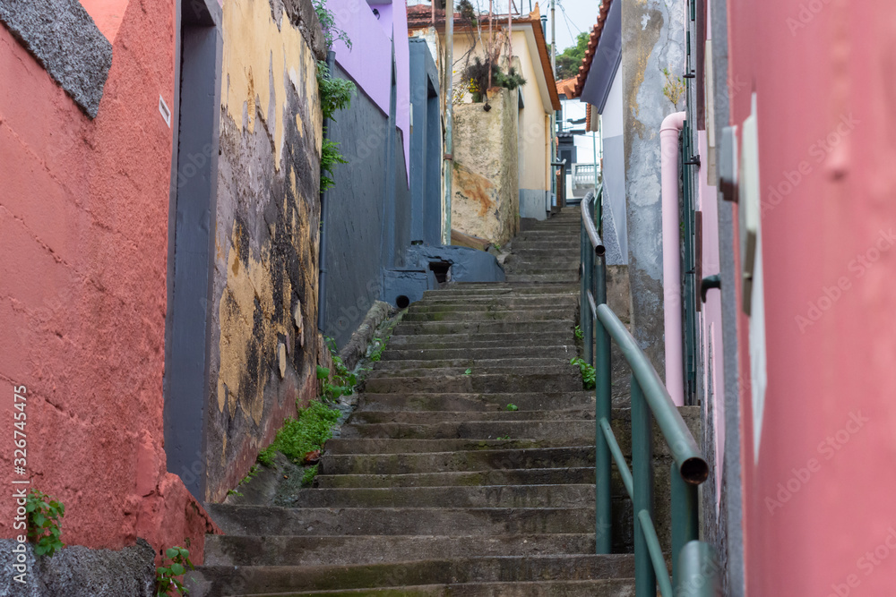 Steep staircase up in the old part of the Funchal town.
