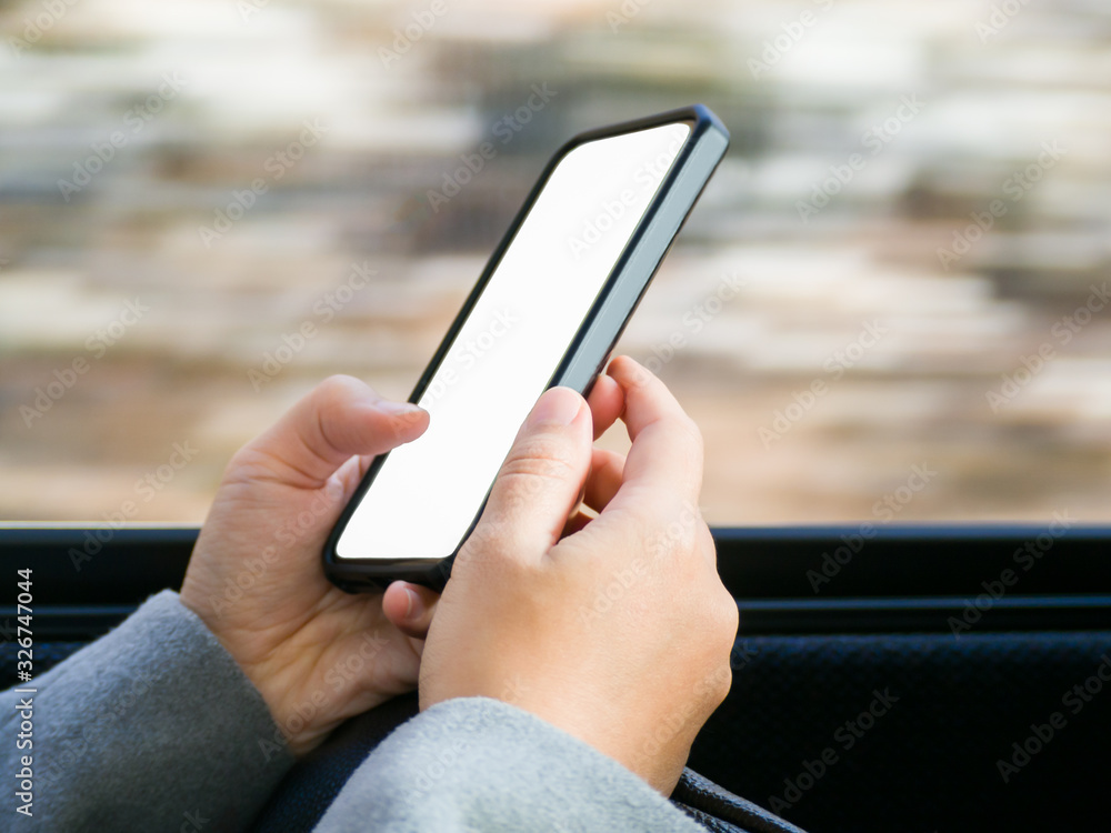 Female hand holding bank mobile smart phone. Close-up image with shallow depth of field focus on hands. Female hand holding bank mobile smart phone. Close-up image with shallow depth of field focus on hands.