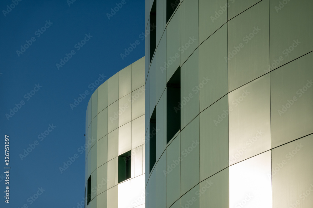 Obraz premium Fragment of a building with a facade made of metal sheets.
