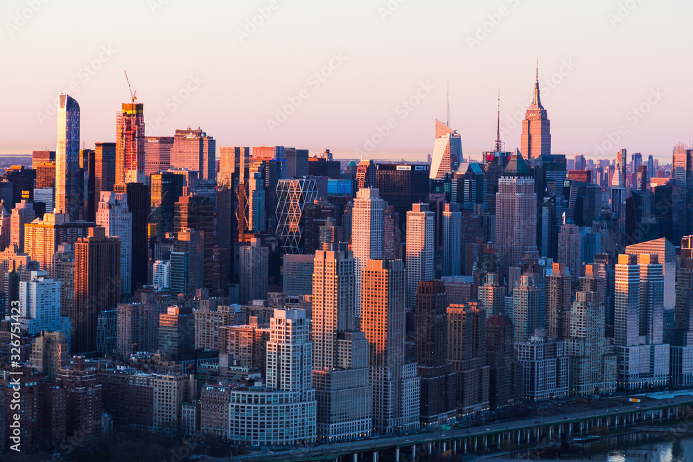 NYC Skyline at Dawn, Empire state, Midtown.  Sunrise pastel hues