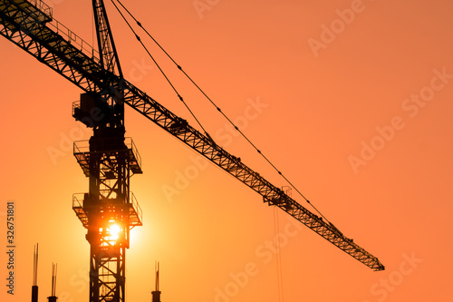 tower crane with sunset background