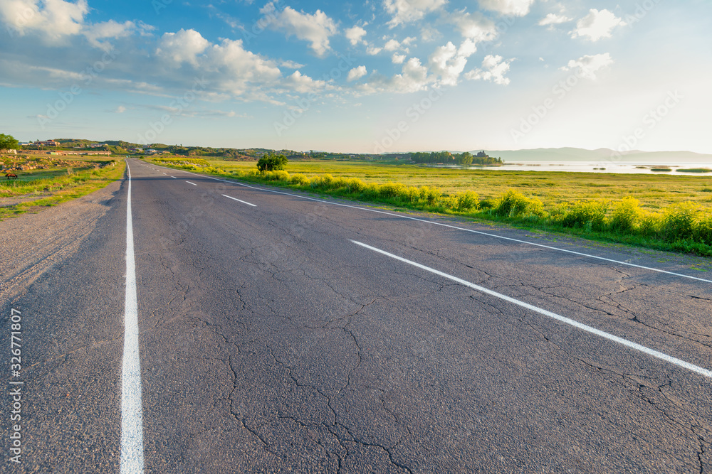 Empty road in Armenia at dawn in a deserted place