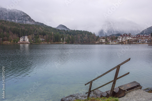 Grundlsee, the largest lake in Styria, Austria, and his beautiful Villa Castiglioni set in the wonderful mountain landscape, in misty winter morning photo