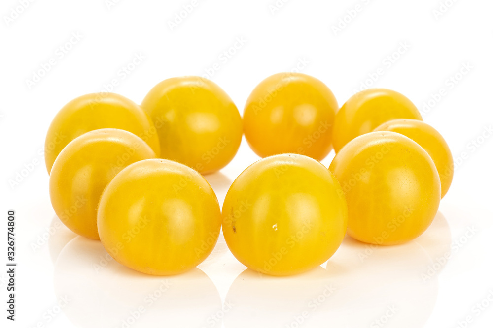 Group of nine whole fresh yellow tomato isolated on white background Group of nine whole fresh yellow tomato isolated on white background