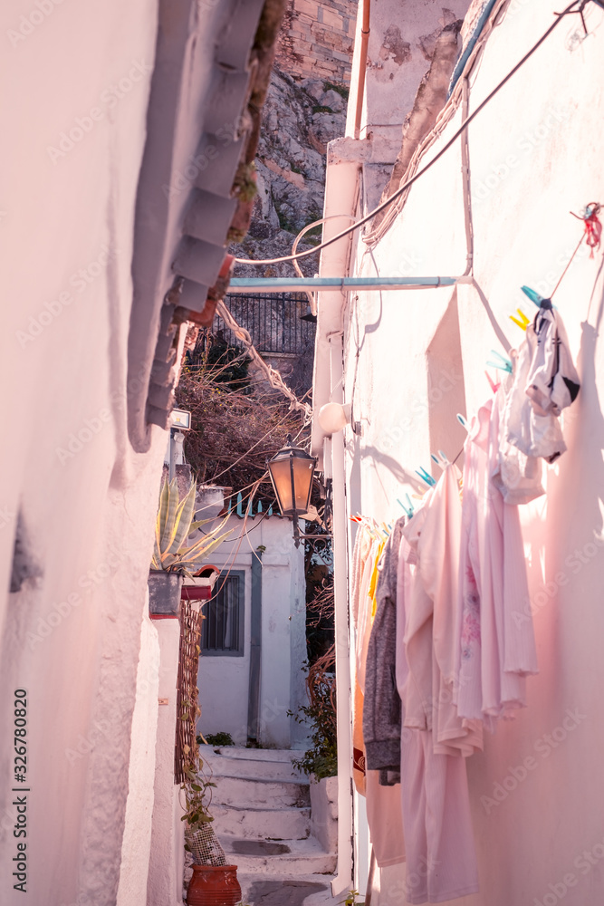 Architectural details from the narrow streets of Plaka, a traditional neighborhood in Athens, on the slopes of Acropolis, Greece Architectural details from the narrow streets of Plaka, a traditional neighborhood in Athens, on the slopes of Acropolis, Greece