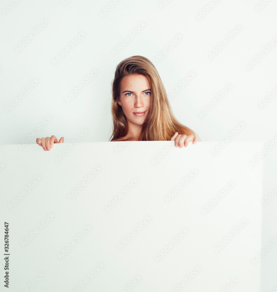 young pretty blonde girl with placard on white background half naked, shopping sale lifestyle people concept young pretty blonde girl with placard on white background half naked, shopping sale lifestyle people concept