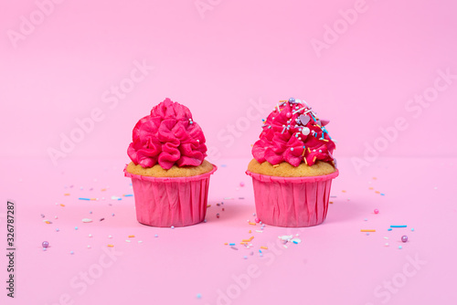 pink cupcakes on pink background colorfull and bright
