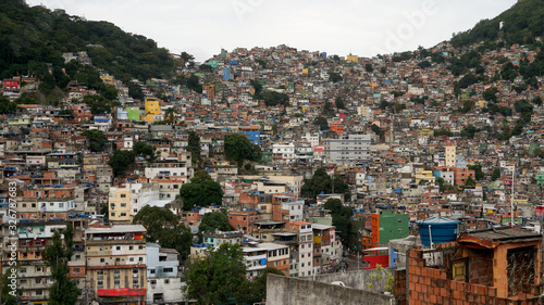 Rocinha is the largest favela in Brazil, located in Rio de Janeiro's South Zone between the districts of São Conrado and Gavea.  photo