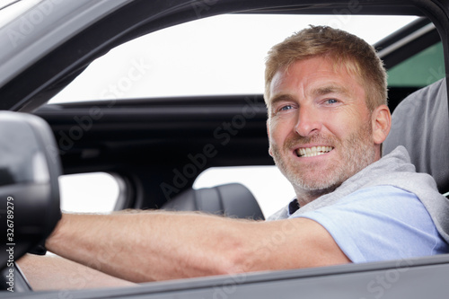 a male taxi driver smiling © auremar