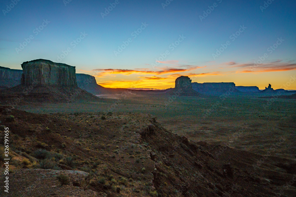 sunset at artists point in monument valley, usa