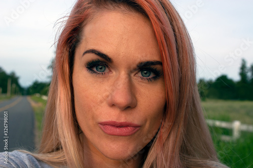 portrait of young woman with pink hair