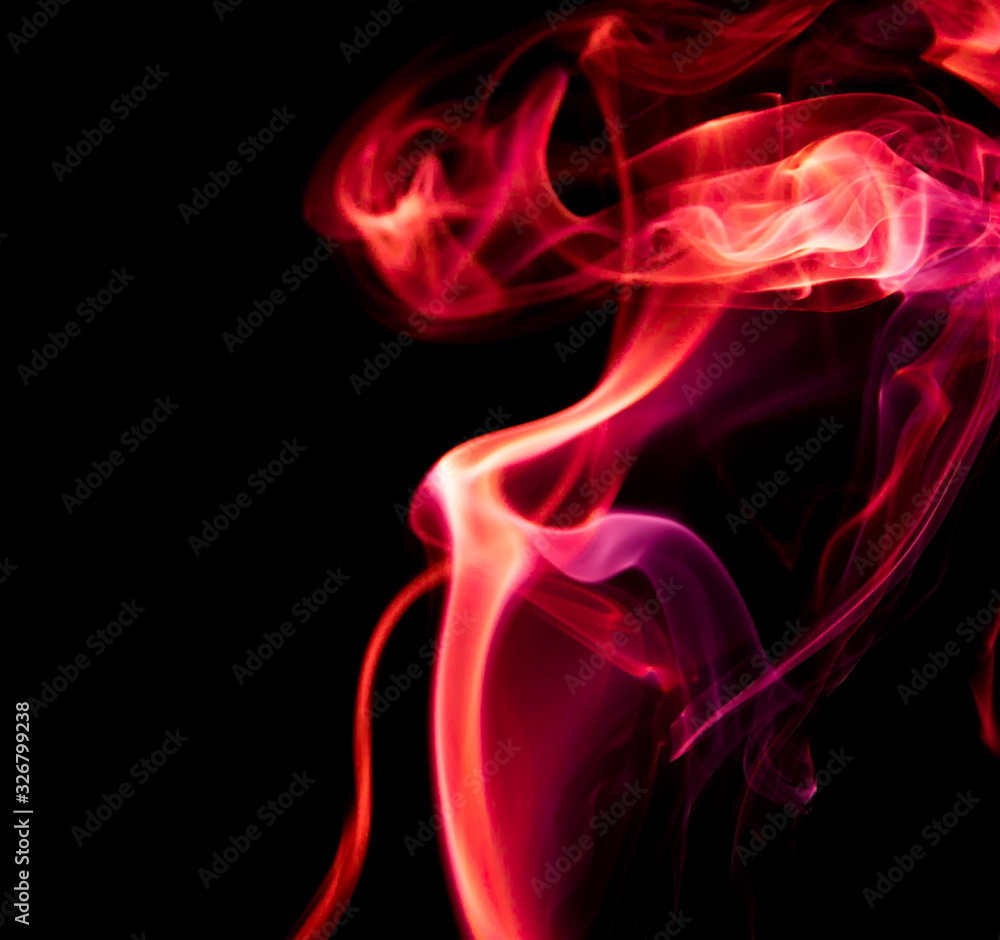 Obraz premium Red smoke on black background