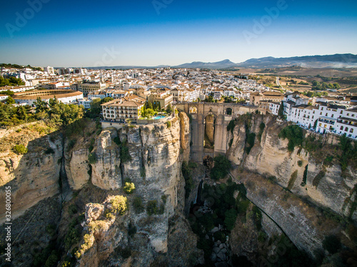 Round amphitheater, a city on the rocks of Ronda, Spain, Europe. White houses on a cliff