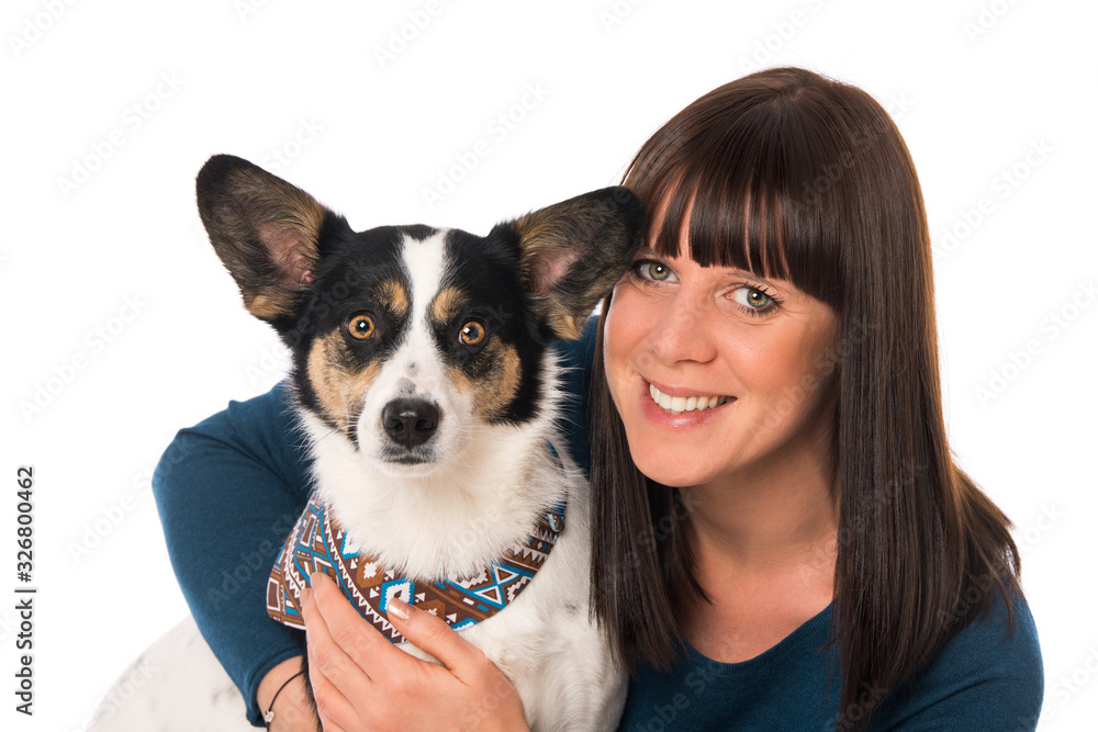 Young woman hugs her dog