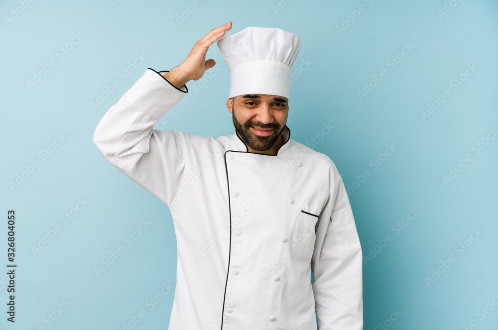 Young latin chef man isolated being shocked, she has remembered important meeting. Young latin chef man isolated being shocked, she has remembered important meeting.