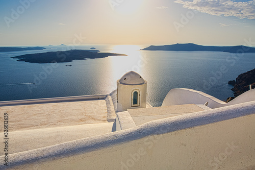 A wonderful and interesting scene in Santorini with the faraway horizon and a Starbright beam