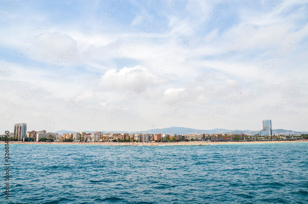 View of Barcelona, Barceloneta beach and Mediterranean sea in summer day at Barcelona, Spain. View of Barcelona, Barceloneta beach and Mediterranean sea in summer day at Barcelona, Spain.