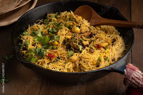 Indian vermicelli upma cooked in cast iron pan