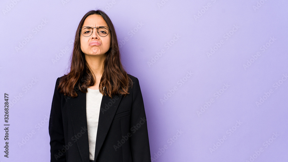 Young mixed race hispanic woman isolated sad, serious face, feeling miserable and displeased. Young mixed race hispanic woman isolated sad, serious face, feeling miserable and displeased.
