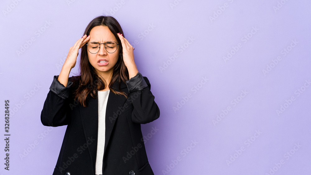 Young mixed race hispanic woman isolated touching temples and having headache. Young mixed race hispanic woman isolated touching temples and having headache.