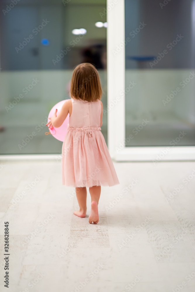 cute little girl playing with balloons cute little girl playing with balloons