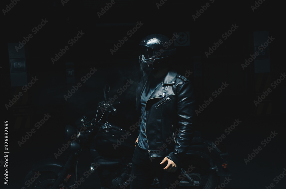  motorcyclist with smoke in the dark
