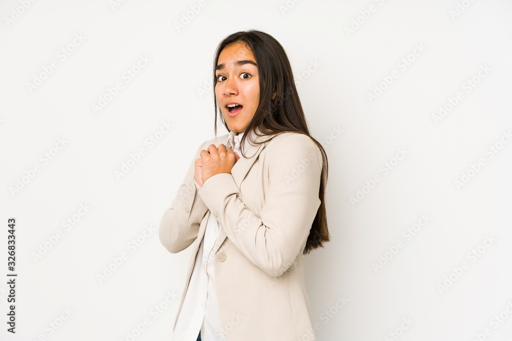 Young woman isolated on a white background scared and afraid. Young woman isolated on a white background scared and afraid.