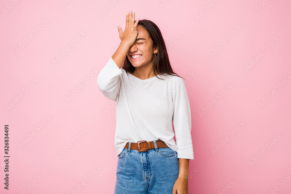 Young mixed race indian woman forgetting something, slapping forehead with palm and closing eyes. Young mixed race indian woman forgetting something, slapping forehead with palm and closing eyes.