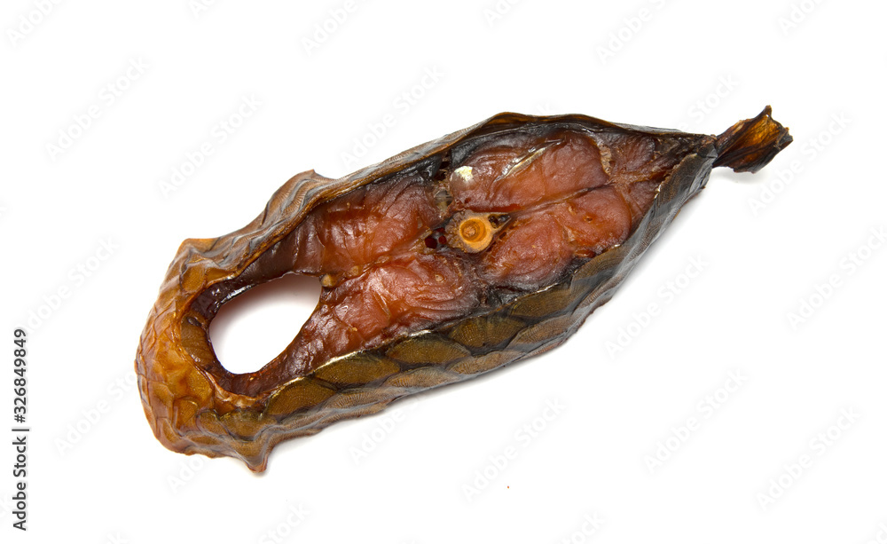 Smoked fish steak isolated on a white background. Smoked fish steak isolated on a white background.