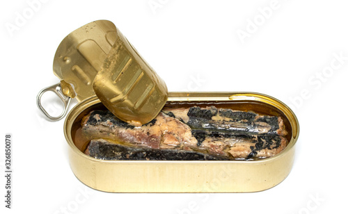 Tin can with fish in oil on a white background. Open oval jar of fish in oil, clipping path.