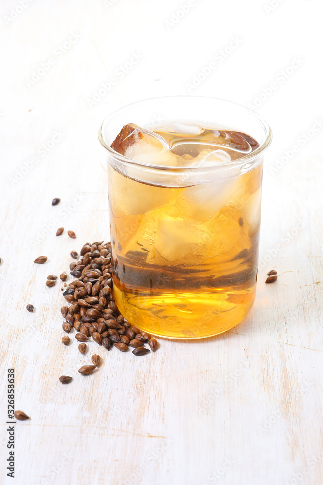 iced barley tea in a glass. caffeine free alternative healthy drink iced barley tea in a glass. caffeine free alternative healthy drink