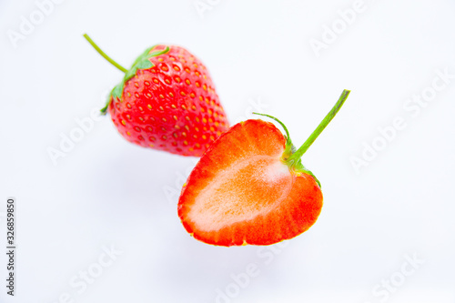 Fresh red strawberry, appetizing isolate on white background and clipping path.