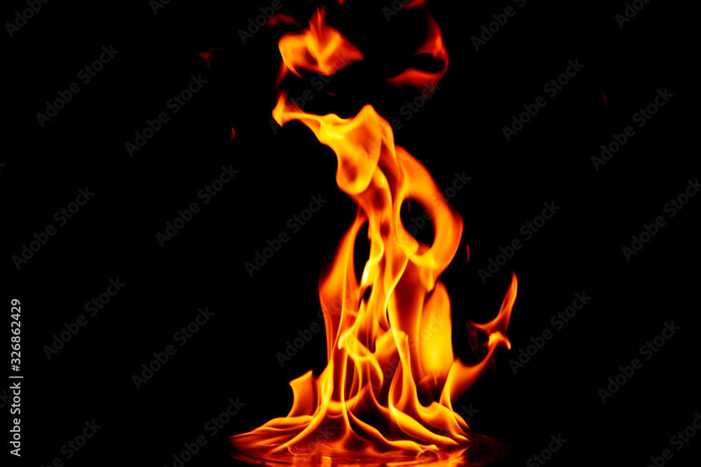 Fototapeta premium Fire flames on black background