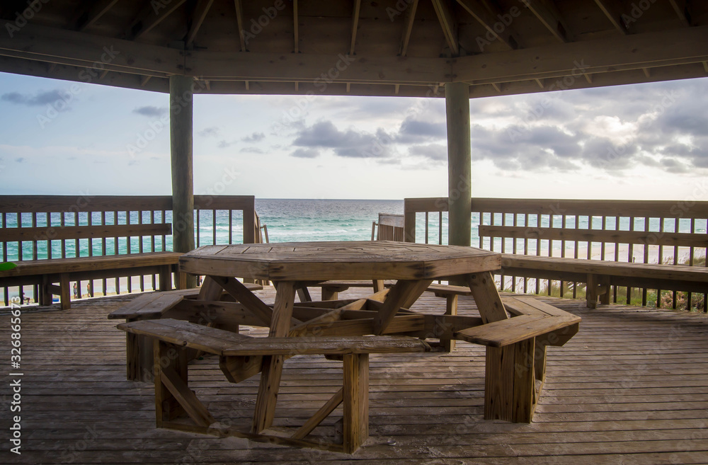 Inside of wooden gazebo by the beach