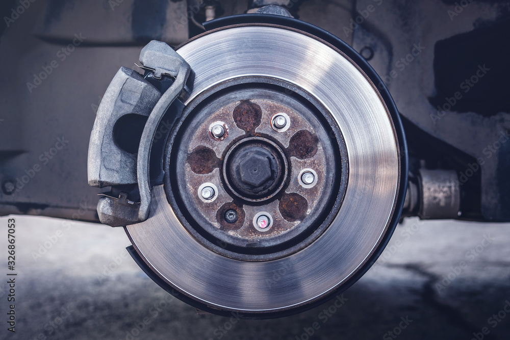 car brake disc with brake pad. rusty brake disc. car brake disc with brake pad. rusty brake disc.
