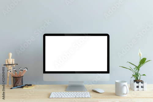 Computer with blank white copy space for text, Mockup design desktop computer in office on wood table with keyboard and Coffee cub, Work place concept.