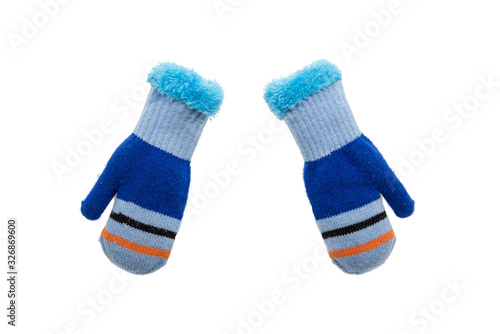 Pair of knitted blue children gloves isolated on white background
