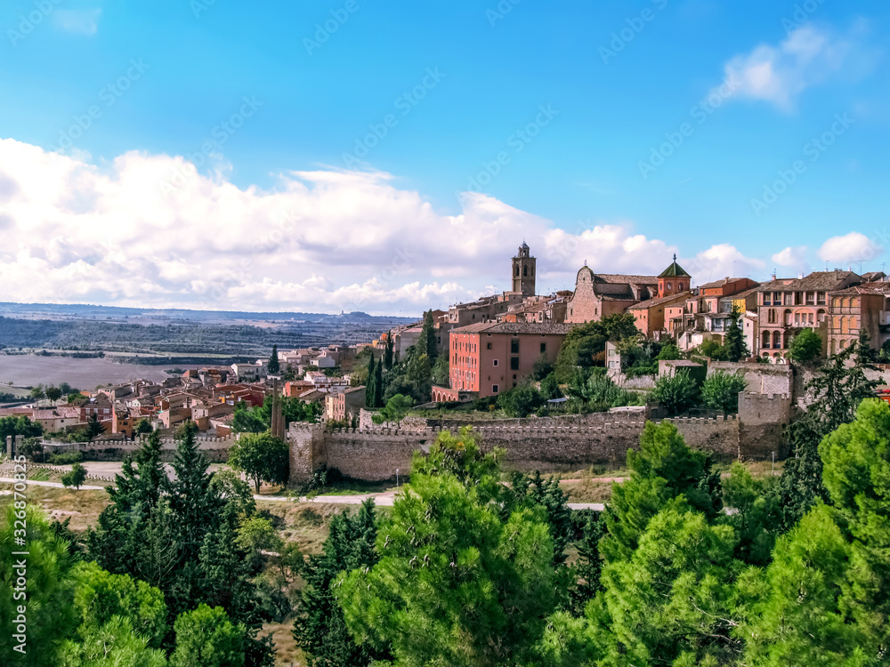 Panorama of the valley with the medieval town of Cervera on a hill (Catalonia, Spain). Beautiful spanish landscape in autumn sunny day