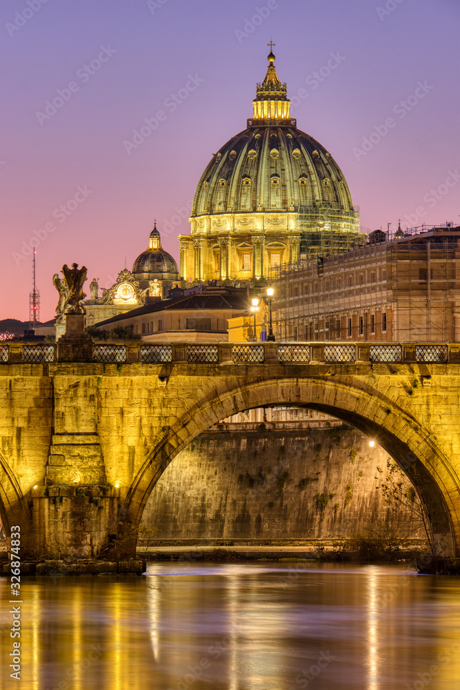 The St. Peters Basilica in the Vatican City, Italy, at twilight
