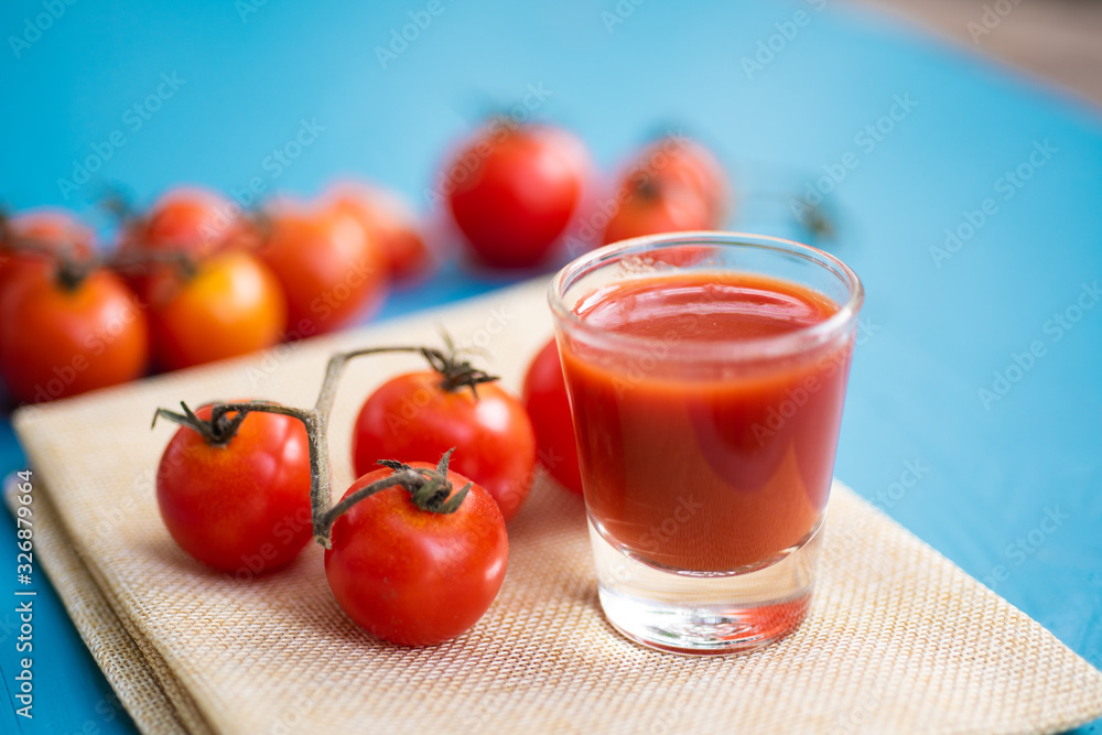 Fresh tomatoes juice in drinking healthy concept. Fresh tomatoes juice in drinking healthy concept.