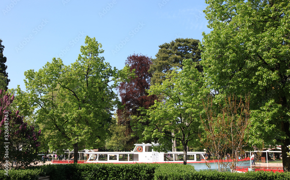 Annecy, France - April 21: Photo of trees in a city park on April 21, 2011 in Annecy, Haute Savoie, France.